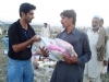 Volunteers of voice are distributing goods at Nowshera, Khyber Pakhtunkhwa – Flood 2010