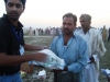 Volunteers of voice are distributing goods at Nowshera, Khyber Pakhtunkhwa – Flood 2010