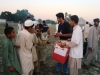 Volunteers of voice are distributing goods at Nowshera, Khyber Pakhtunkhwa – Flood 2010